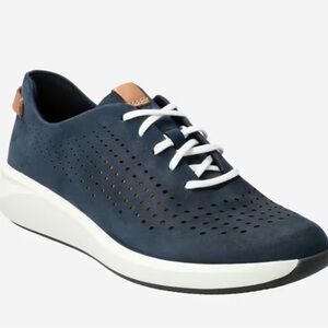 Clarks Art.
Un Rio Tie Navy Sneakers with White Sole